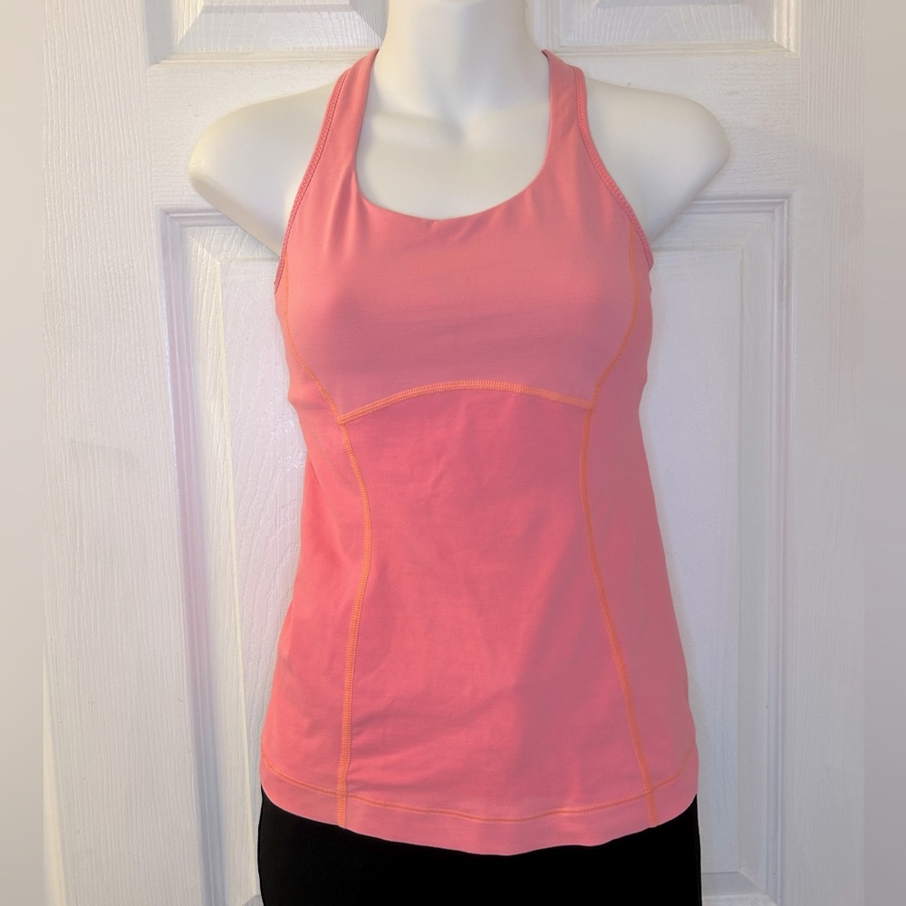 Lululemon “Run: Pace” tank in grapefruit orange-pink, size 4